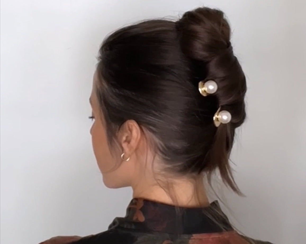 chignon hairstyle with Leonor Greyl Holiday Gift Set hair pins