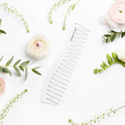 leonor greyl detangling comb with pink flowers and greenery