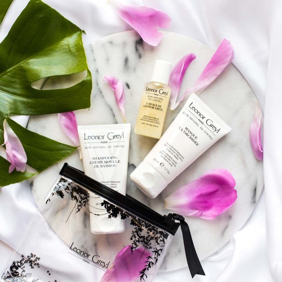 Leonor Greyl Luxury Travel Kit for Dry, Thick or Frizzy Hair with flower petals