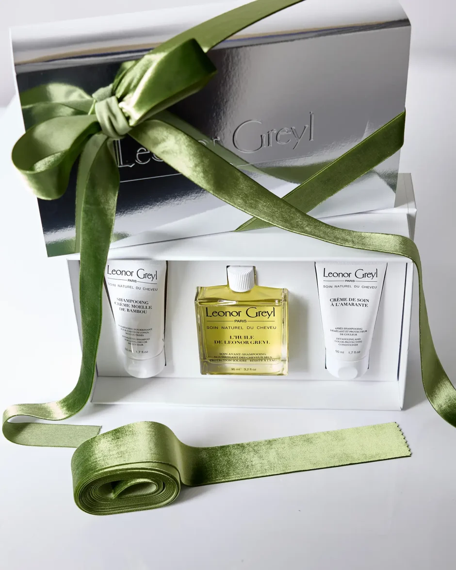Leonor Greyl Holiday 2025 gift box with green ribbon
