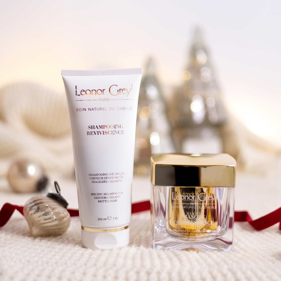 Shampooing Reviviscence & Masque Quintessence Duo with holiday decorations and ribbon