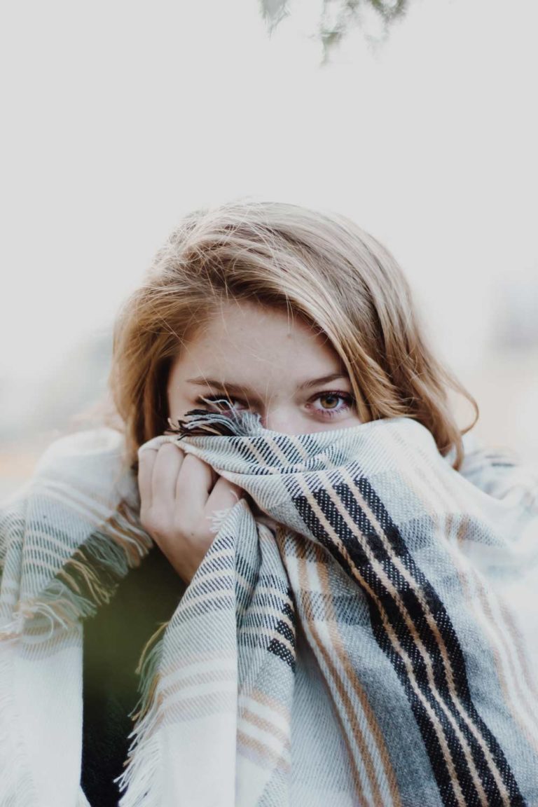 girl with plaid blanket